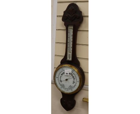A late Victorian carved oak wheel barometer, H.78cm