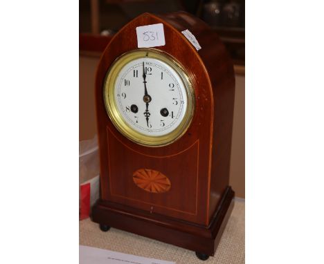 An early 20th century inlaid mahogany mantel clock