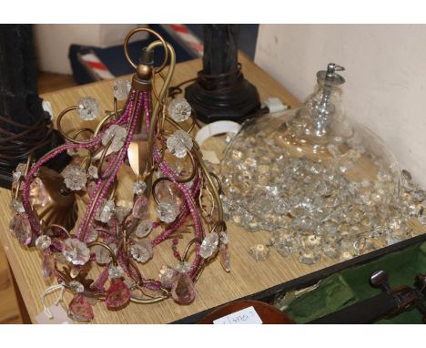 A Venetian-style ceiling light and a glass bag-shaped light