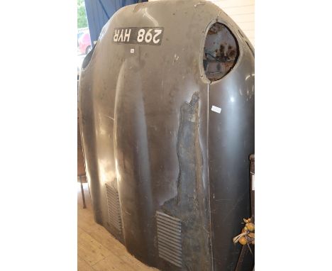 An E-type Jaguar bonnet, serial 860183 Series 1, W.164cm, H.182cmCONDITION: The bonnet has been repaired with a large piece o