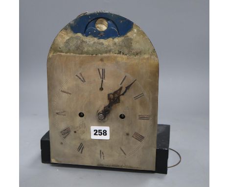 A small longcase clock movement with moon face, height 26cm