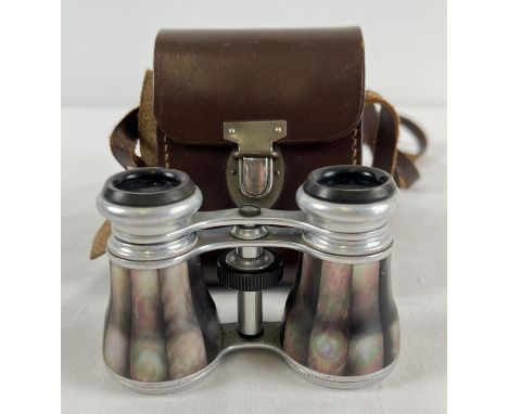 A pair of mother of pearl set opera glasses with a leather carry case. 