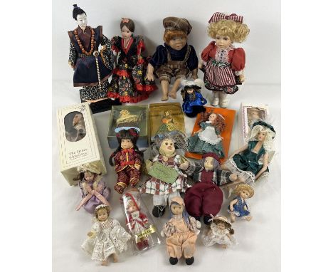 A box of assorted small and dolls house sized ceramic collectors dolls, some boxed. 