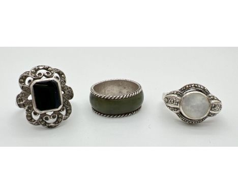 3 silver dress rings. To include a band style set with green agate and an Art Deco style dress ring set with marcasite stones