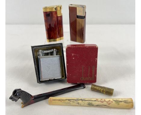 A small collection of assorted vintage smoking related items to include lighters and cigarette holders. Lot comprises: 2 Art 