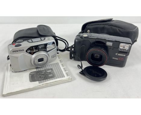 A Pentax Espio 738G camera (with zoom lens) with carry case &amp; instruction book. Together with a Canon Prima 105 camera wi