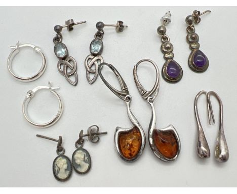 6 pairs of silver and white metal earrings for pierced ears. In both hoop and drop styles. To include Celtic design set with 