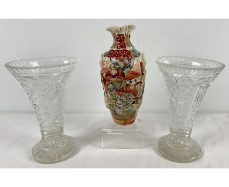 A vintage Chinese ceramic Satsuma style vase with hand painted figural detail and applied drop handles of ribbon and tassle d