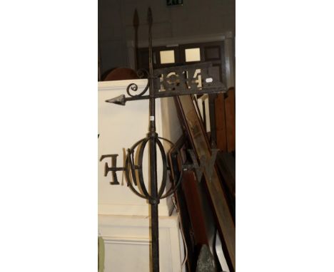 An early 20th century weather vane with copper top, dated 1914