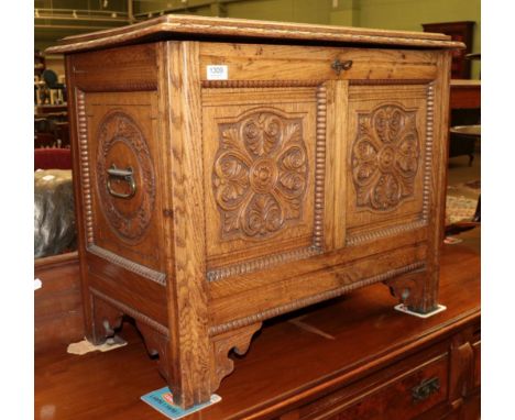 A Victorian carved oak chest with hinged lid, 75cm by 42cm by 62cm together with an early 20th century firescreen, with flora