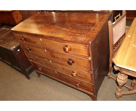 A late George III mahogany four drawer straight fronted chest on bracket feet 
