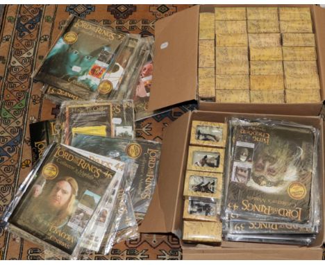 Lord of the Rings, M.M.V. New Line Productions, sixty-two figures and games boards, in original unopened packaging 