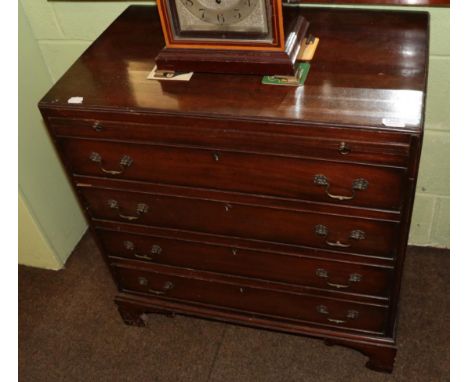 A 20th century mahogany caddy top bachelors chest with brushing slide