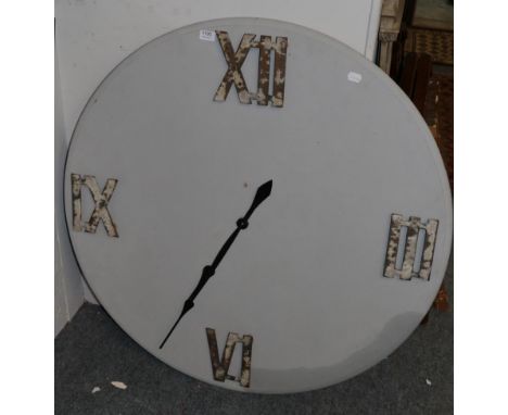 A large grey painted homemade wall clock 
