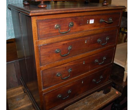 A small George III mahogany square front chest of four long graduated drawers on bracket supports, width 67cm