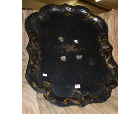 A Victorian papier-mâché tray, of shaped form, with mother of pearl inlays and heightened in gilt (worn throughout), 58 x 77c