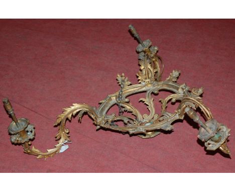 A French three light gilt metal hanging electrolier, of all-over cast floral form 