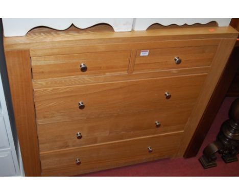 A contemporary light oak squarefront chest of two short over three long drawers, w.90cm 