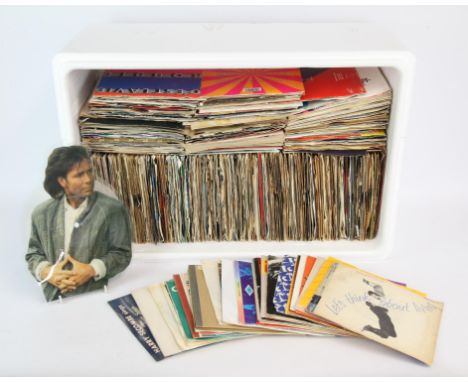 250+ Vinyl 7 inch singles including The Beatles, Elvis, Madonna, ELO, Abba, Billy Idol, Cat Stevens, Madness and others. 