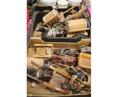 TWO TRAYS OF ASSORTED CERAMIC HORSE AND CART FIGURES 