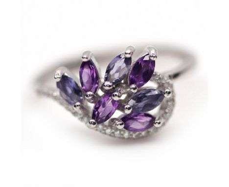 A 925 silver ring set with marquise cut amethysts, iolites and white stones, (N).
