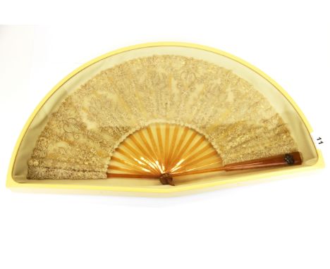 A cased celluloid fan with crown and seed pearl decoration, case W. 61cm.