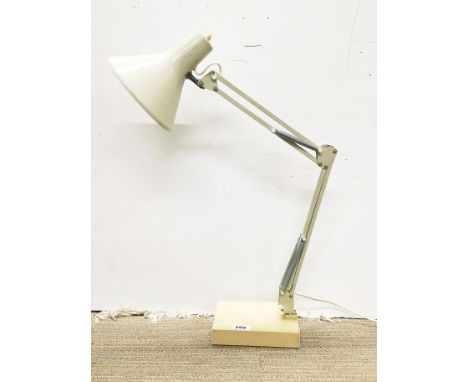 A vintage anglepoise table lamp.