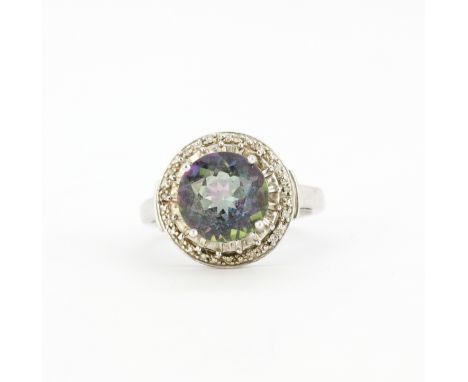 A 925 silver ring set with a large round cut mystic topaz and diamonds, (O).