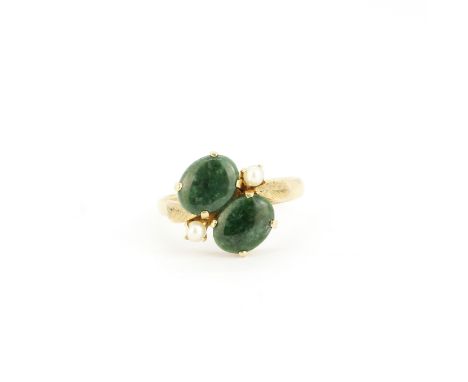 A 14ct yellow gold ring set with oval cabochon cut jade and seed pearls, (R ).