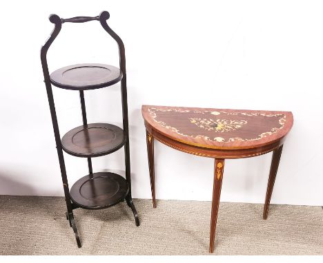 A folding oak cake stand and an Italian inlaid console table.