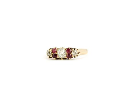 An antique hallmarked 18ct yellow gold ring set with rose cut diamonds and rubies, (Q).