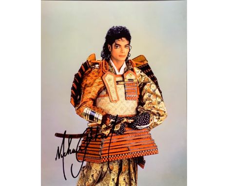 Autograph interest: Autographed colour photograph of Michael Jackson (1958 - 2009 American) with Todd Mueller certificate, 8 