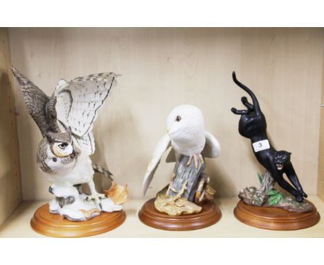 Three Franklin Mint ceramic figures on wooden bases, tallest H. 35cm. Small repair to owl wing.