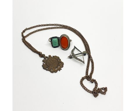 Two vintage silver rings and marcasite brooch with metal chain and fob.