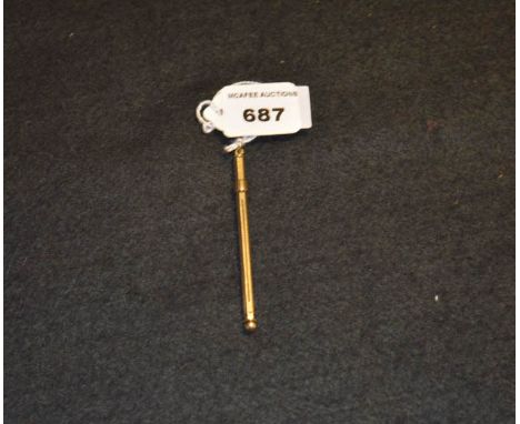 A 9ct Gold Engine Turned Swizzle Stick