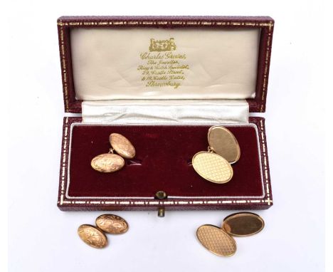 A pair of 9ct gold cufflinks, with engine turned decoration, together with a further pair of 9ct gold cufflinks, total weight