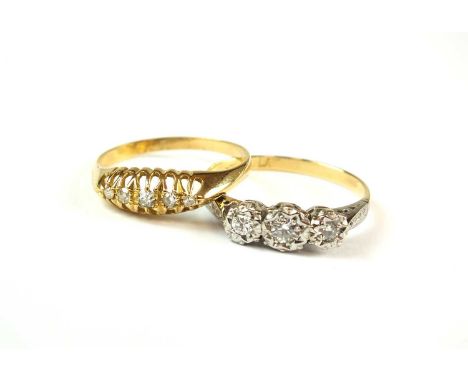 An 18ct gold graduated five stone diamond ring, size N, together with a three stone graduated diamond ring, stamped '18ct pla