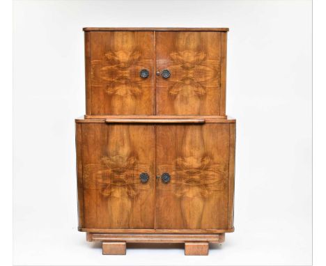 An inter-war period Art Deco style walnut cocktail cabinet by Duros, the upper section of 'piano top' form with twin quarter-