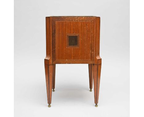 A Regency style inlaid mahogany and kingwood jardiniere, of canted square section with cast brass ring handles, inlaid with c