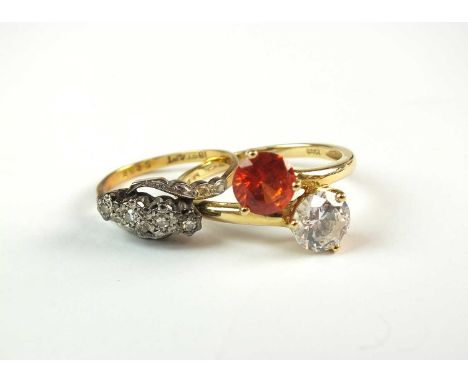 A graduated four stone diamond ring, stamped '18ct &amp; PT', size K 1/2, weight approx 2.5g, together with a 14ct gold cubic