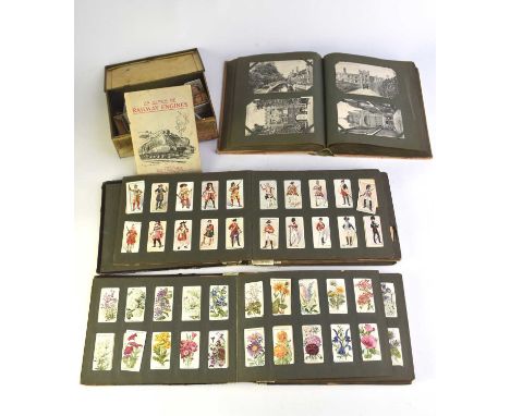 A collection of cigarette cards to various albums with some loose sets, including: Wills Railway Engines (50); Wills Allied A