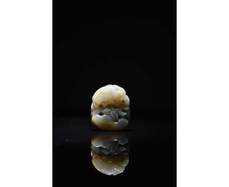 A Chinese carved pale green and russet jade pendant, Qing Dynasty, carved with lotus flowers, leaves and pods, 4.5cm.Negligib