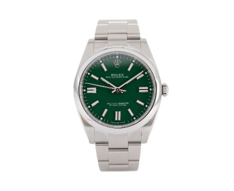 Rolex Oyster Perpetual 41mm featuring the Green Dial from 2023 in fantastic condition. Supplied with box, papers, manuals and