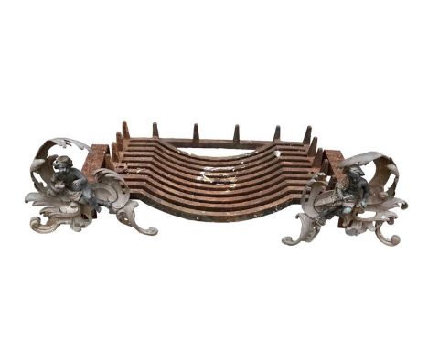 Pair of Antique French gilt metal chenet, with cherub and scroll ornament, together with a fire grate