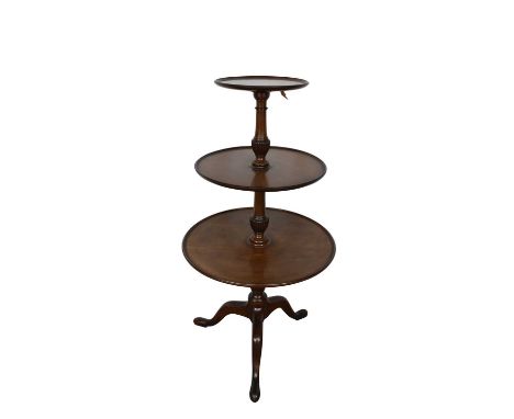 George III mahogany dumb waiter, with three graduated tiers, the lower two revolving, with vase shaped column, on tripod cabr