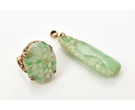 Antique Chinese carved green jade pendant with fruit and foliage, 52mm, together with a similar dress ring in 9ct gold settin