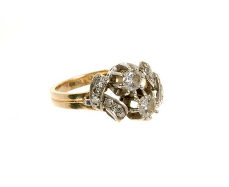 Diamond two stone ring with two brilliant cut diamonds estimated to weigh approximately 0.60cts in total, with further diamon