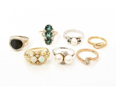 18ct gold stylised band ring, 14ct gold opal and diamond carved scroll ring, 14ct gold black onyx and diamond set signet ring