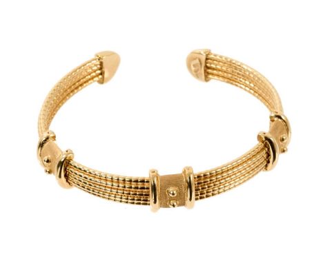 18ct gold torque bangle with applied beaded gold bands, London 1998.Weighs approximately 30.02 grams. Very good condition.