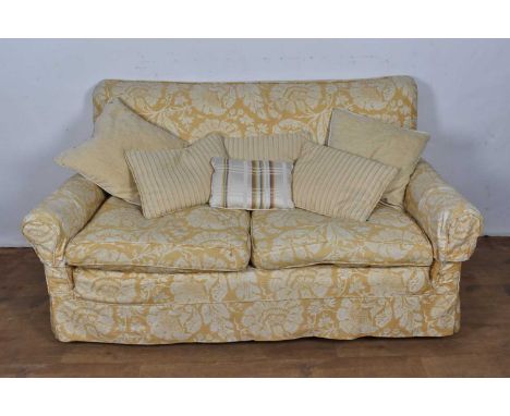 Twin seater sofa of square form, 141cm wide. Provenance: From the Estate of Douglas Wilmer (1920-2016) star of stage and scre